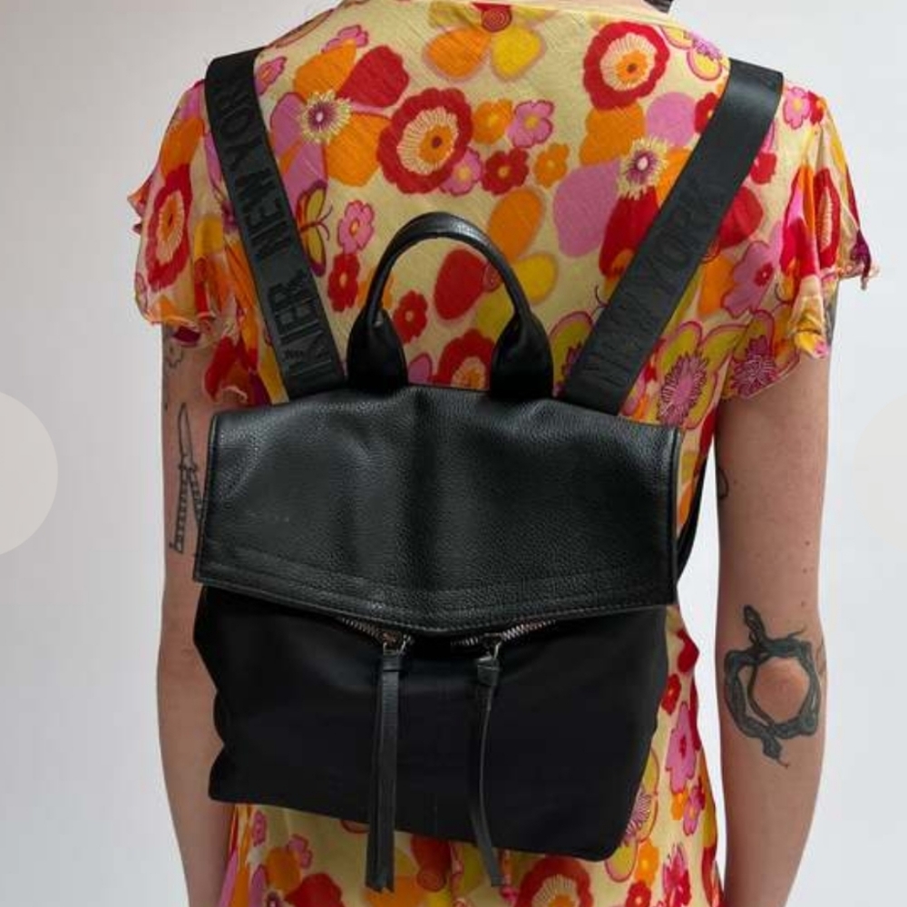 Botkier black nylon shoulderbag with logo straps and a leather flap
